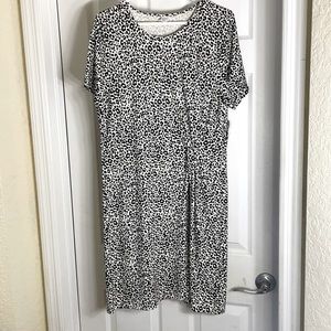 NWT short sleeved animal printed dress. Shoulder to hem approximately 39 inches